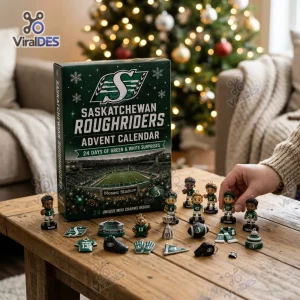 Front view of Saskatchewan Roughriders Advent Calendar box and mini charms on a wooden table.