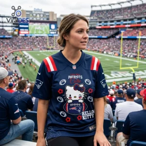 Front view of a woman wearing a navy blue football jersey in a stadium.