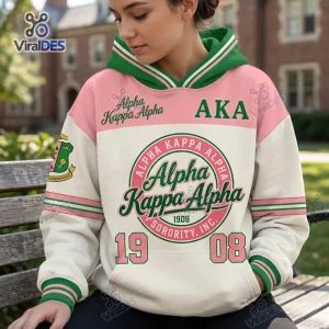 Front view of an Alpha Kappa Alpha Sorority hoodie in pink, green, and cream with collegiate lettering and seal.