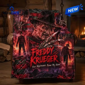 Front view of a Freddy Krueger Nightmare fleece blanket draped over a leather armchair near a fireplace.