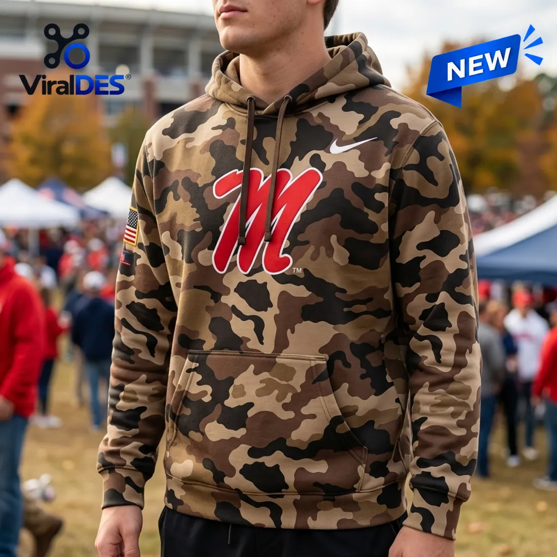 Front and back view of the Ole Miss Rebels 2026 Military Appreciation Camo Hoodie displaying the cursive red M chest logo and navy OLE MISS back banner