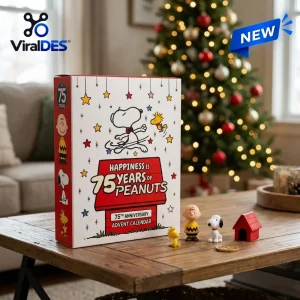 Front view of Peanuts 75th Anniversary Collectible Advent Calendar with character figurines on wooden table.