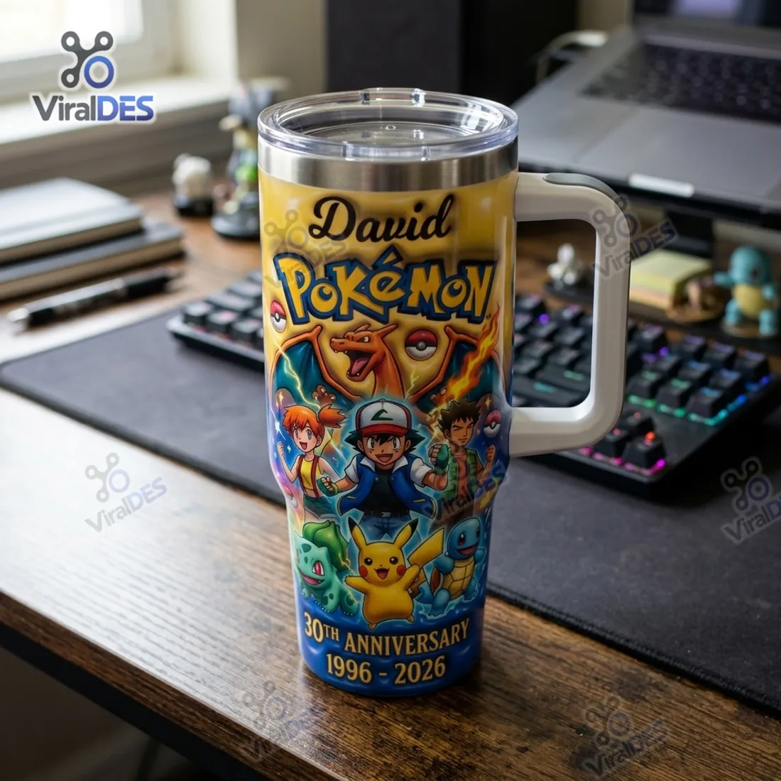 Pokemon 30th Anniversary 1996-2026 Tumbler Cup with custom name David resting on a gaming desk beside a mechanical keyboard