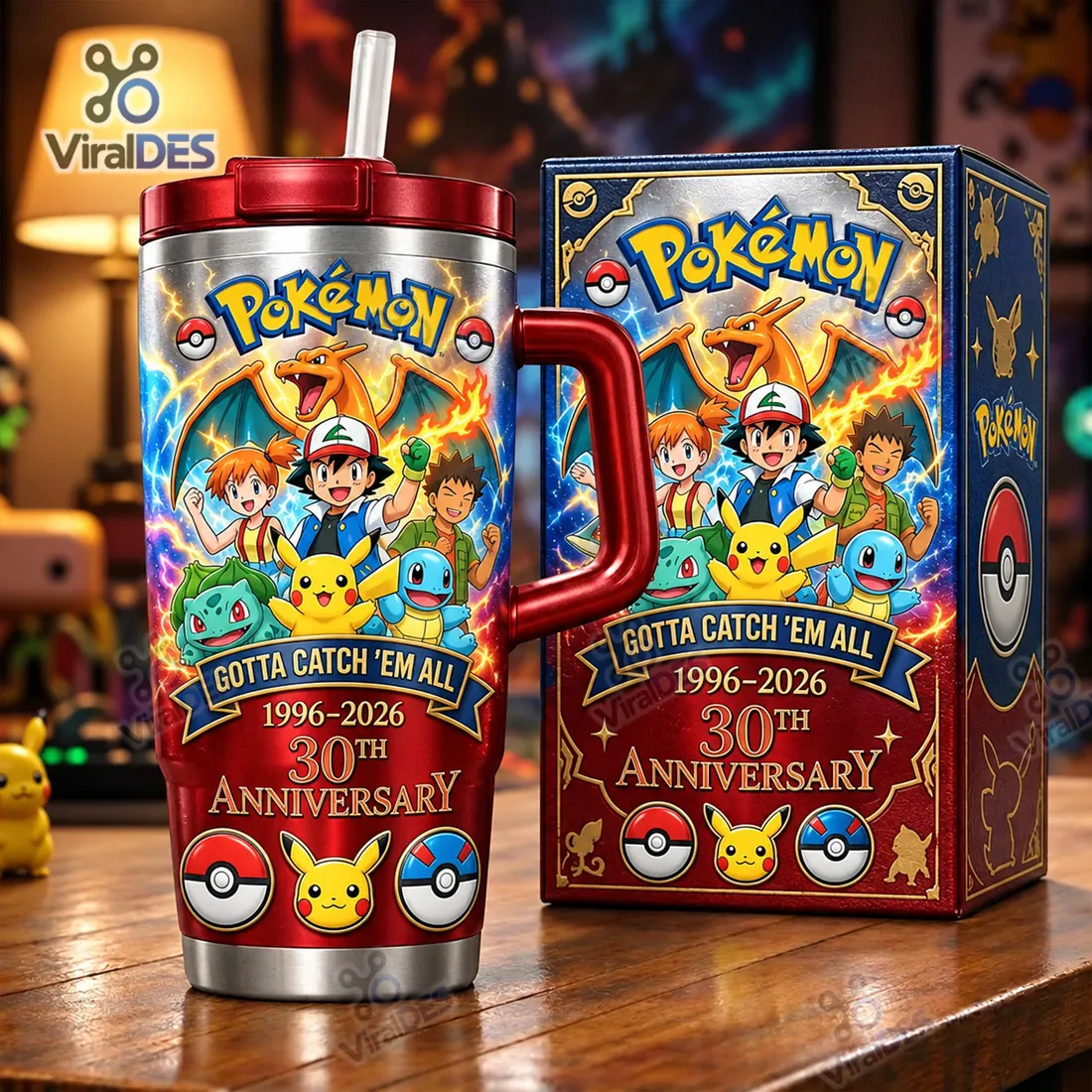 Pokemon 30th Anniversary 1996-2026 Tumbler standing beside its matching navy and crimson collector presentation box