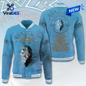 Front and back view of the Eagles 50th Anniversary Blue Varsity Jacket with song list and bird skull graphic.