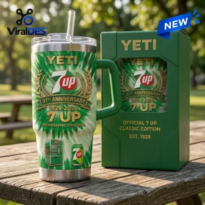 Front view of Yeti 7Up 97th Anniversary Handle Tumbler on wooden picnic table.
