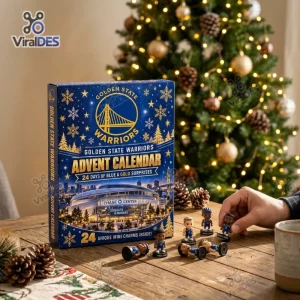 Front view of the Golden State Warriors 2026 Advent Calendar on a wooden table with miniature figures and a Christmas tree background.