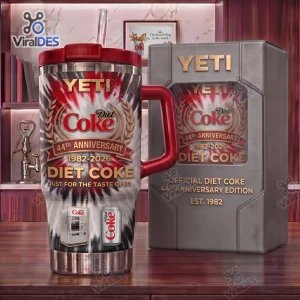 Front view of YETI Diet Coke 44th Anniversary Handle Tumbler with matching box on a wooden surface.