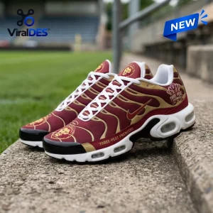 Side view of Brisbane Lions 2026 AFL Premiers Air Max Plus sneakers on concrete.