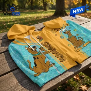 Front view of the Scooby-Doo Spirit Animal Zip-Up Hoodie on a wooden table outdoors.