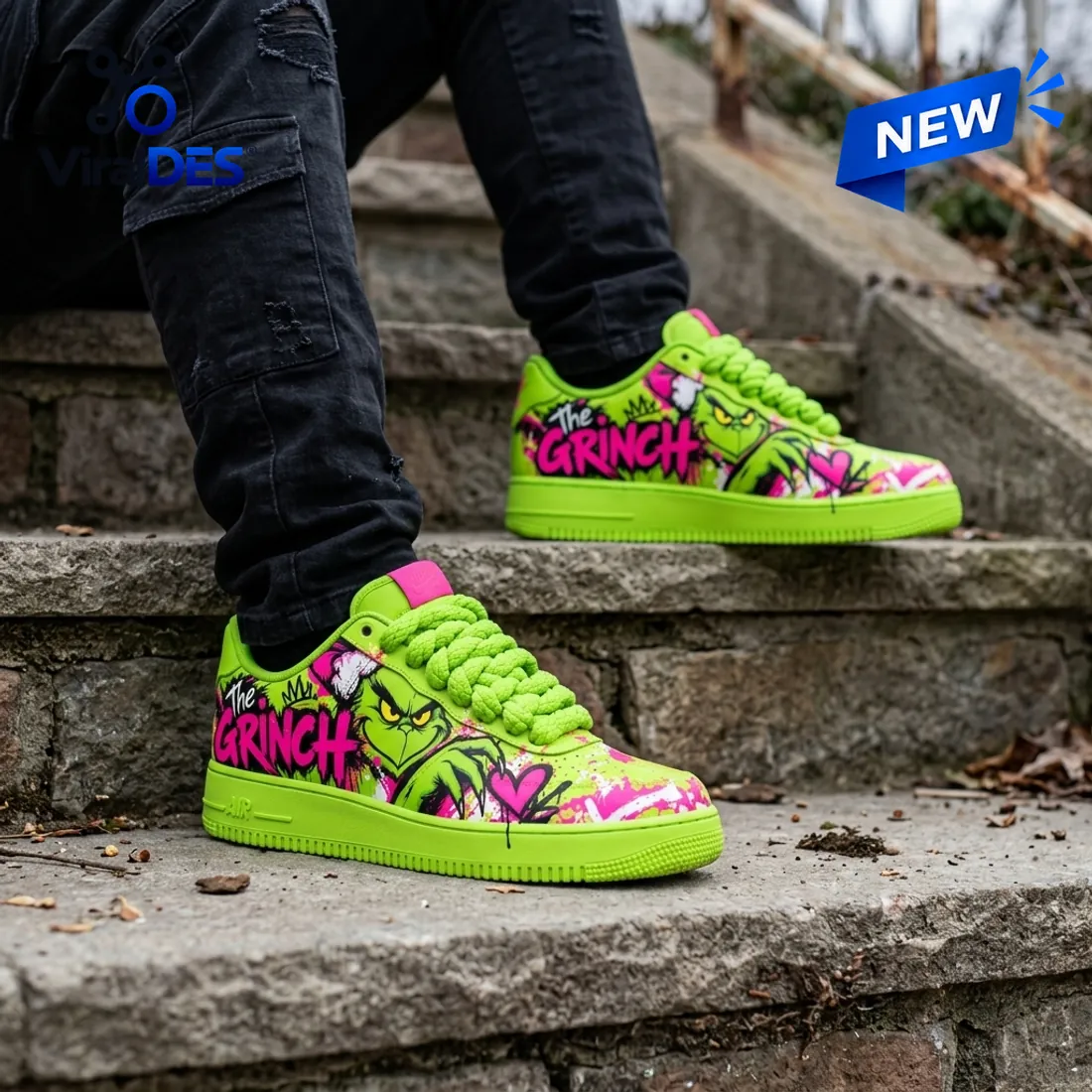 Angled pair view of The Grinch Neon Green Air Force 1 Shoes showing the splatter toe box, twisted rope laces, and hot-pink tongue tag