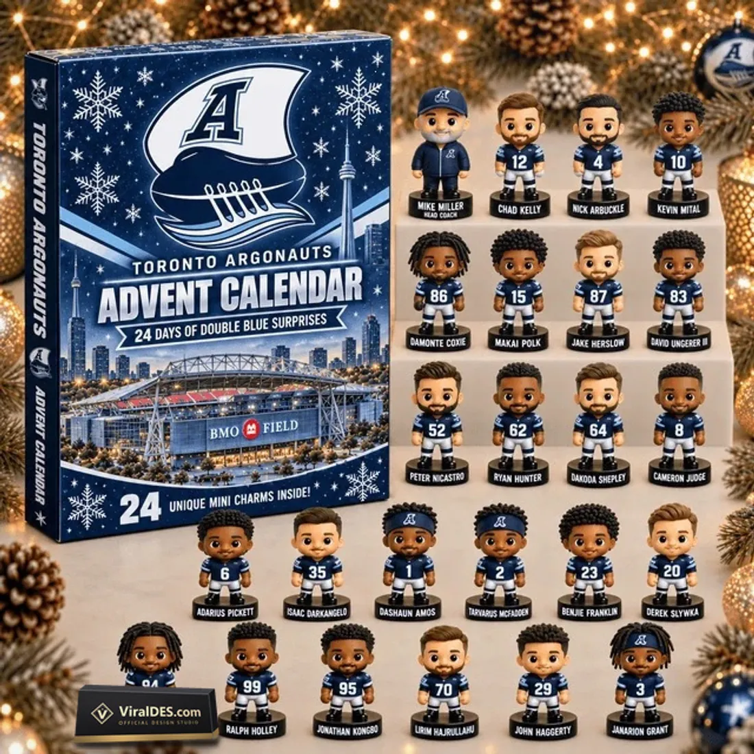 Toronto Argonauts 2026 Advent Calendar full 24-piece Double Blue miniature figurine lineup beside the BMO Field countdown box