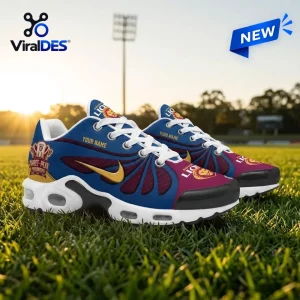 Side view of Brisbane Lions 2026 AFL Premiers Air Max Shoes on grass.