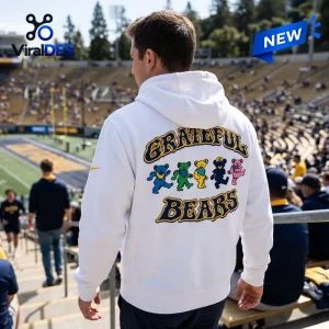 Back view of a person wearing a white California Golden Bears Grateful Dead hoodie in a stadium.