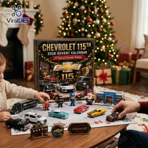 Front view of the Chevrolet 115th Anniversary Advent Calendar 2026 box with toy cars displayed on a wooden table.