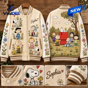 Front and back views of a cream custom name varsity jacket featuring cartoon character graphics and floral sleeves.