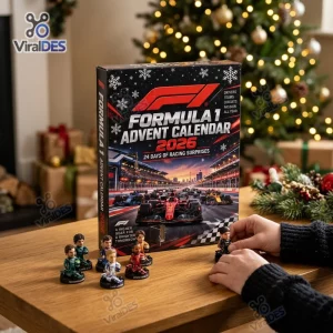 Front view of the Formula One 2026 Advent Calendar box on a wooden table with racing figurines.
