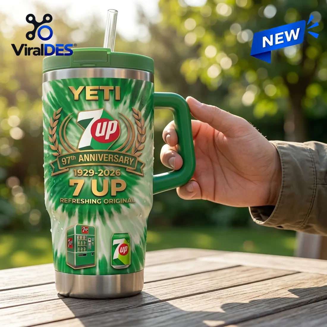 Close-up view of the Yeti 7Up 97th Anniversary Handle Tumbler displaying the golden wreath crest, 1929-2026 banner, vintage vending machine, and 7Up can graphics