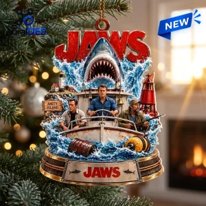 Front view of Jaws Amity Island Christmas holiday ornament hanging on a pine tree.