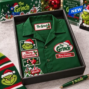 Front view of The Grinch Green Christmas Bowling Hawaiian Shirt in a gift box with embroidered patches.